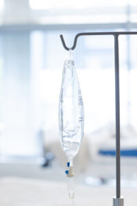 Picture of an IV bag hanging on a hook