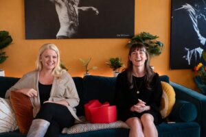 Patients in a wellness clinic in Boulder discussing recovery and treatment options in a relaxed environment.