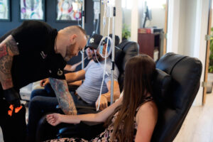Patient receiving IV therapy treatment in a Boulder wellness clinic with professional supervision.