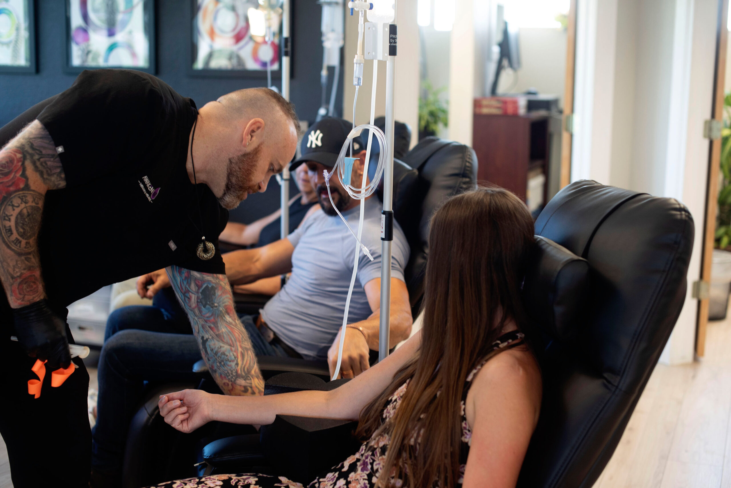 Patient receiving IV therapy treatment in a Boulder wellness clinic with professional supervision.