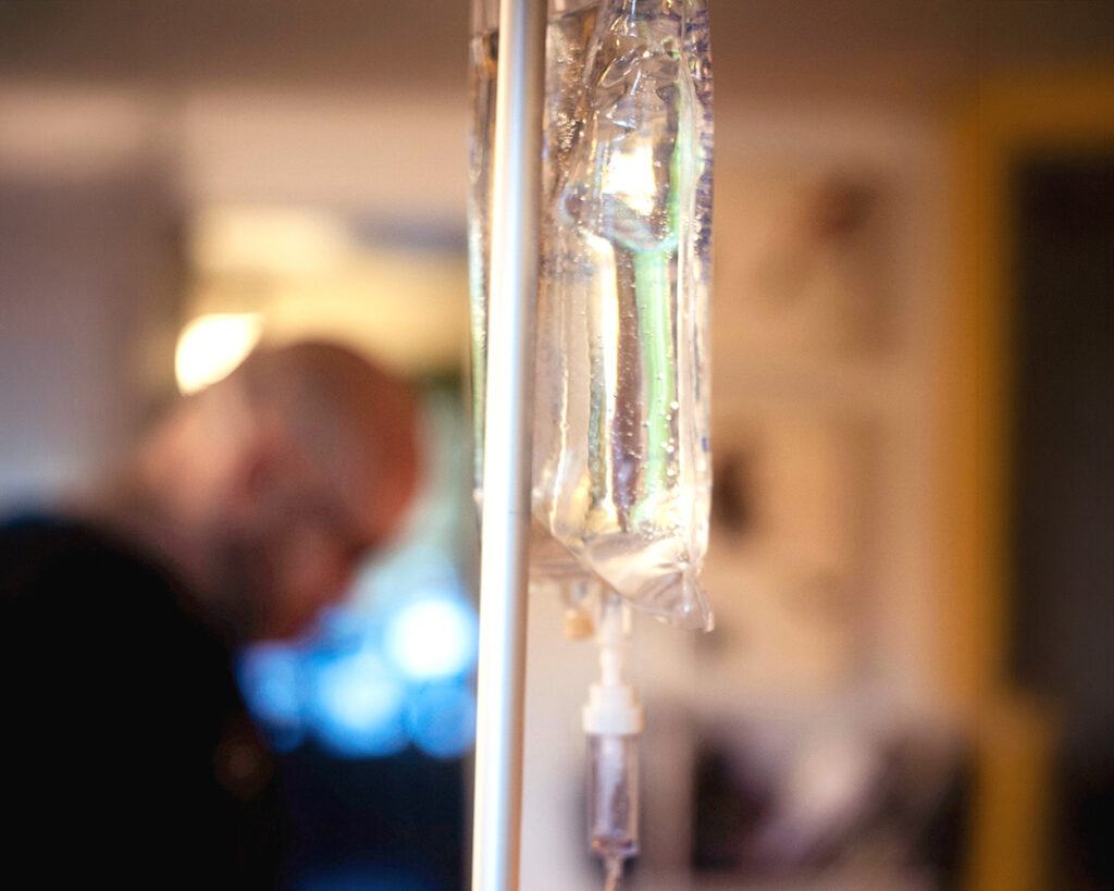 Patients receiving Myers drip IV therapy in a professional clinic environment