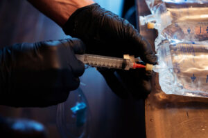 Patient receiving NAD IV therapy in a wellness clinic in Boulder