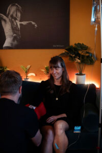 Patient receiving NAD IV therapy in a wellness clinic in Boulder