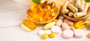 NAD oral supplements and capsules on a table