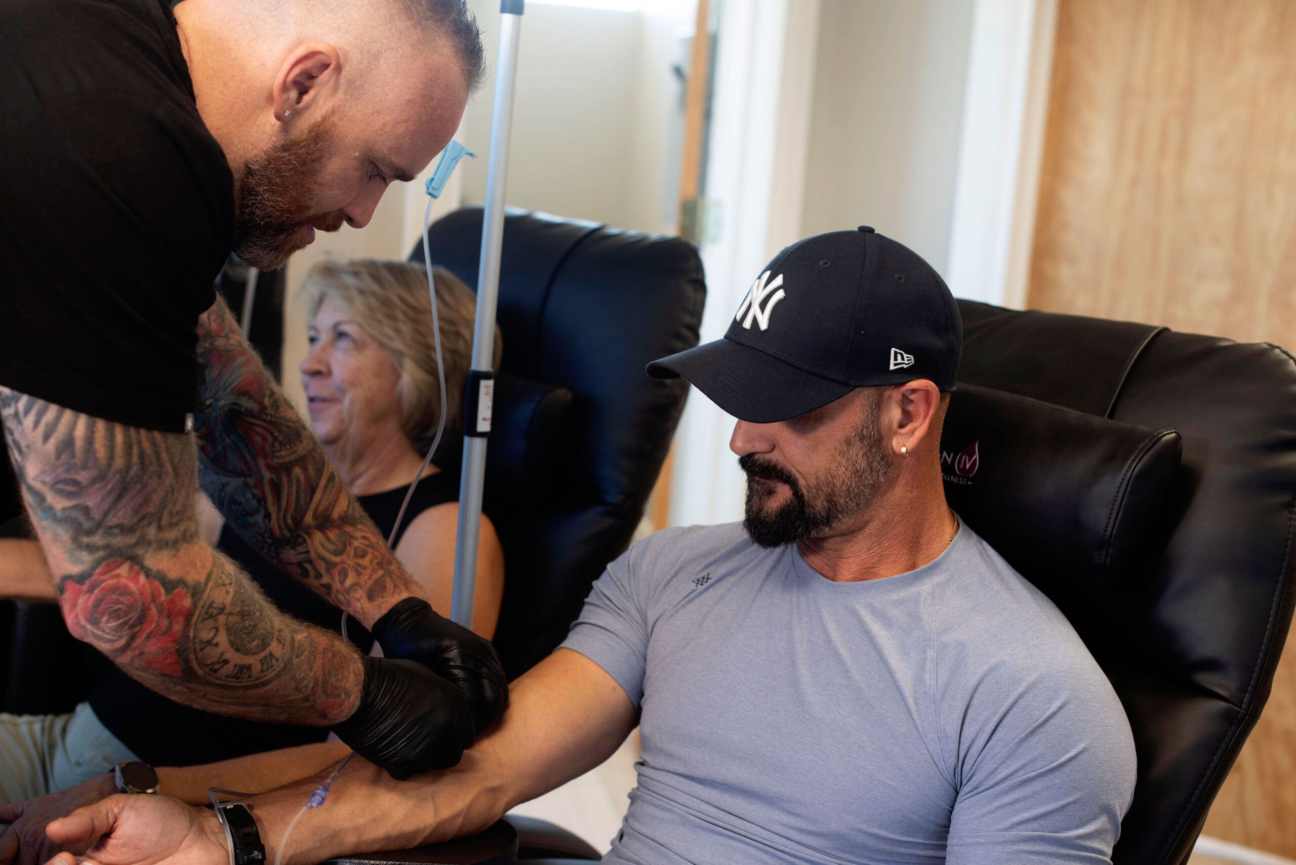 IV therapy session in a clinical setting showing treatment process